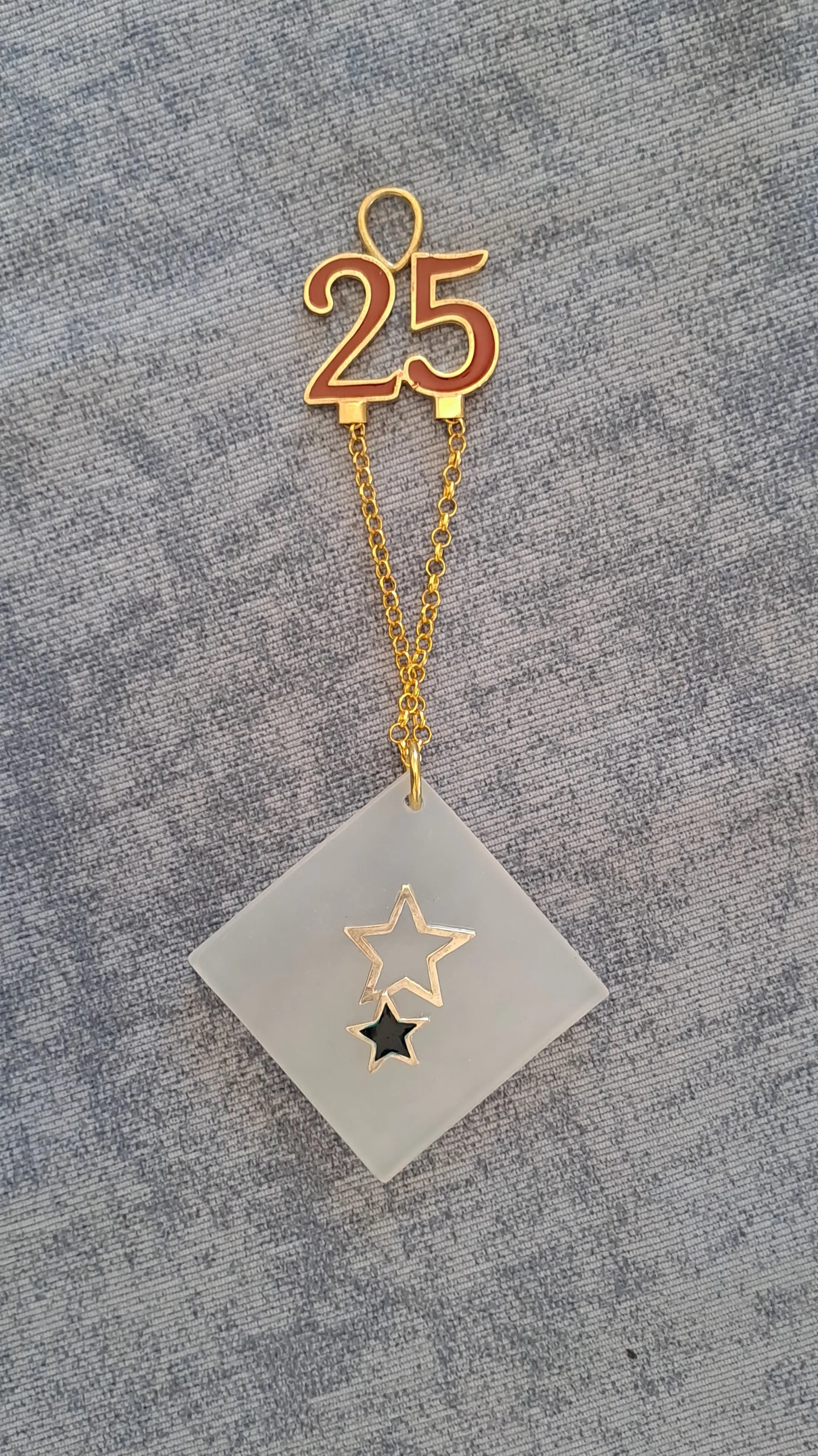 Sterling silver charm on Plexiglass - Star Charm